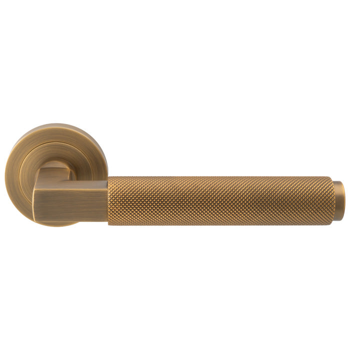 Carlisle Brass Terazzo Lever On Round Rose Knurled